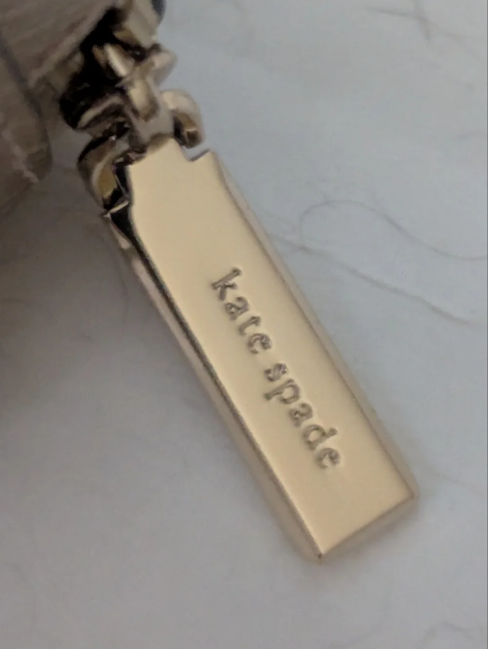 Kate Spade Metallic Rose Gold Mini Zip Jewelry Case